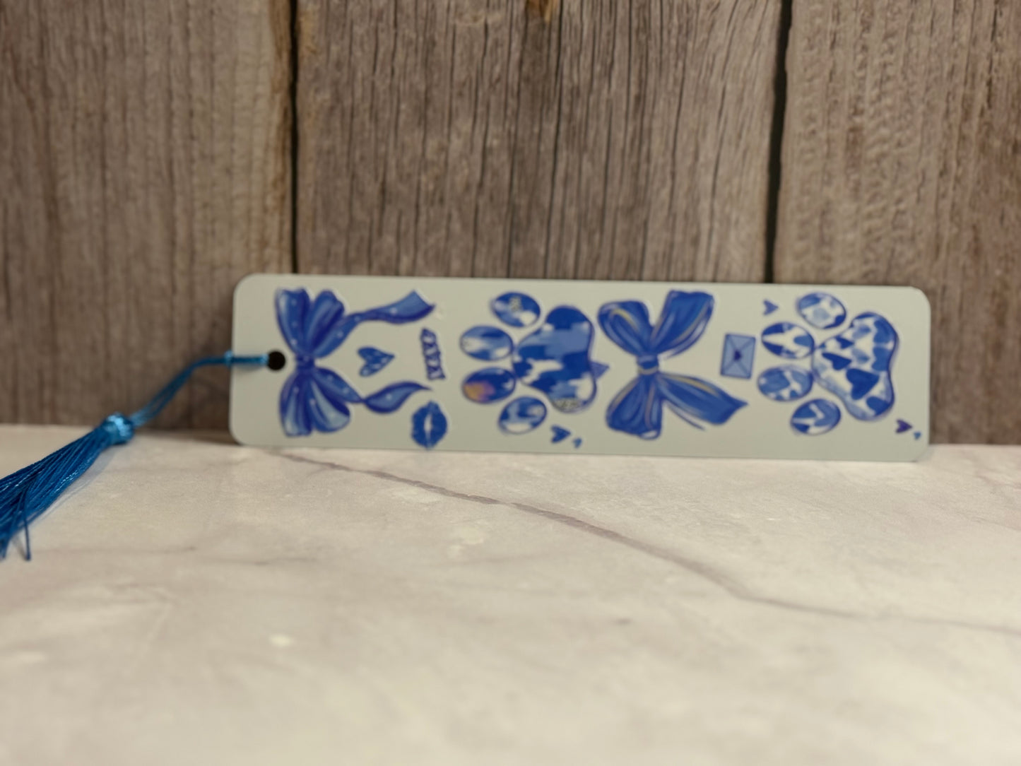 Blue dog paw and ribbons metal double sided bookmark